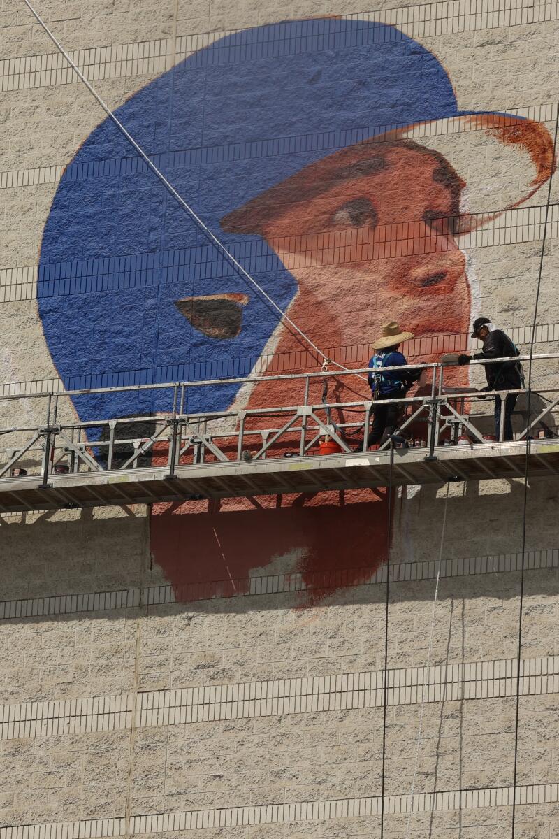 A new mural is put up of Dodgers player Shohei Ohtani on Tuesday, March 12, 2024 in Los Angeles, CA.