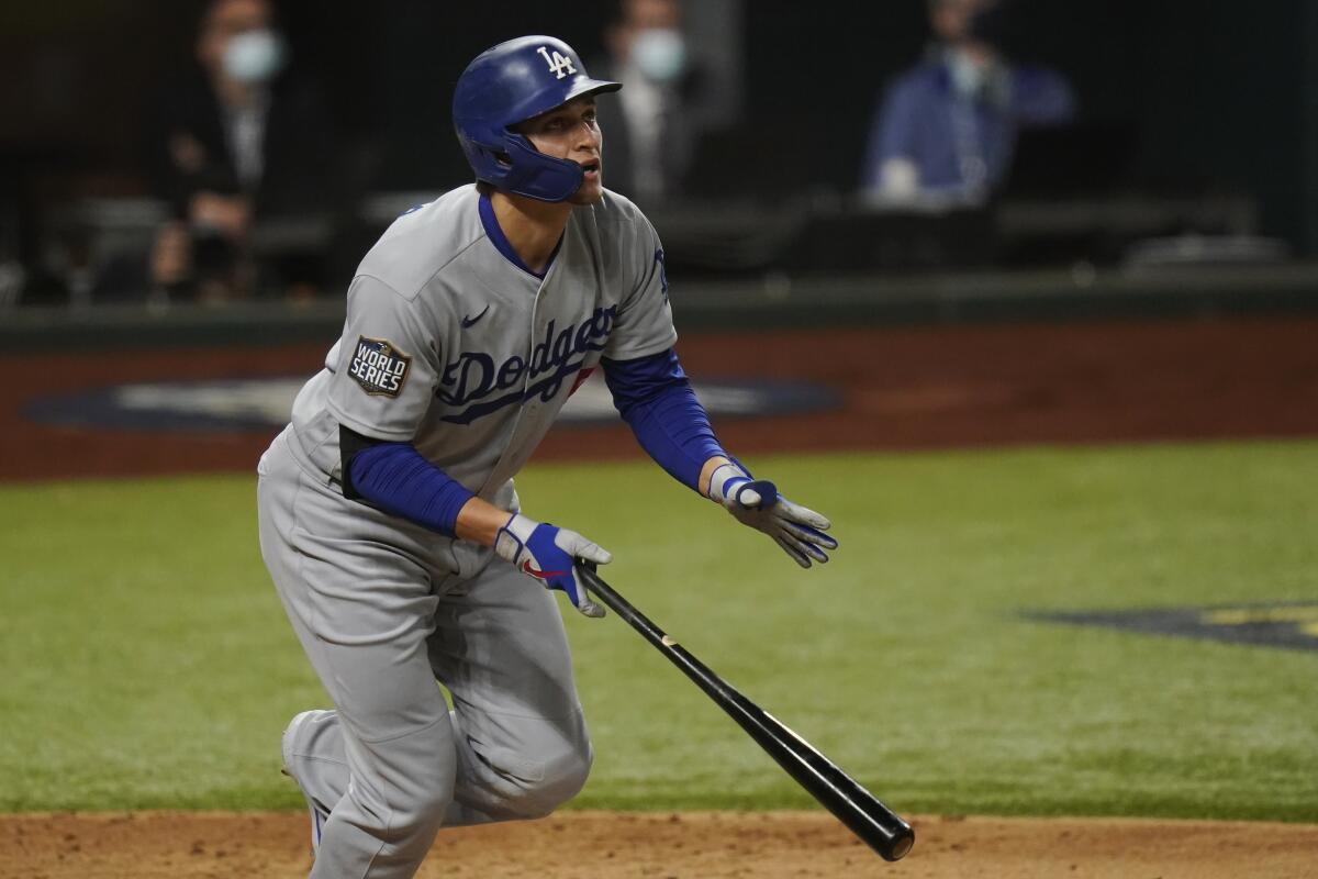 Corey Seager drops his bat as he begins to run the bases.