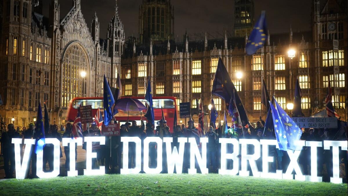 Anti-Brexit protesters demonstrate Dec. 10, 2018, outside the Houses of Parliament in London.