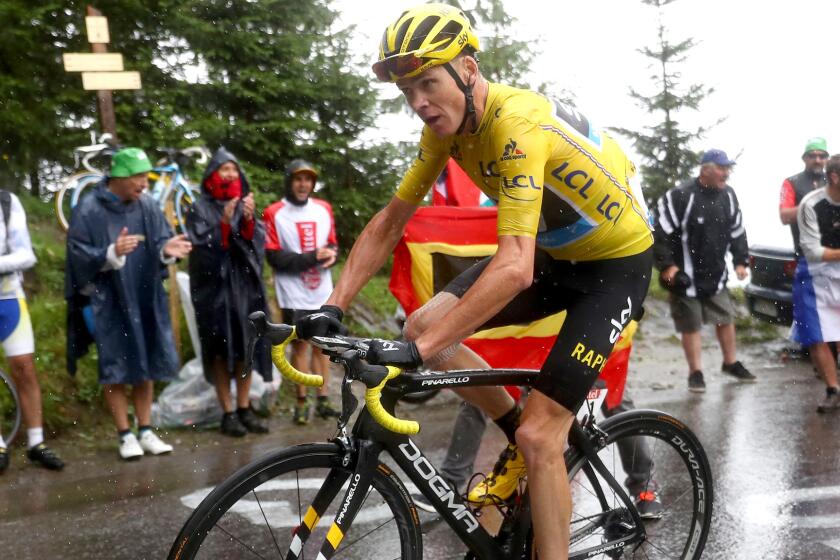 Tour de France leader Chris Froome climbs Col de Joux Plane during the 20th stage on Saturday.