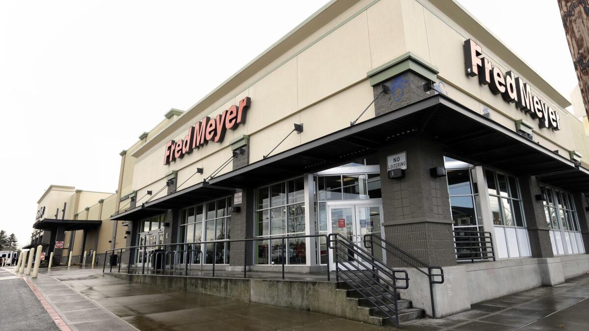 Fred Meyer stores, based in Portland, Ore., above, will stop selling guns and ammunition, the company announced.