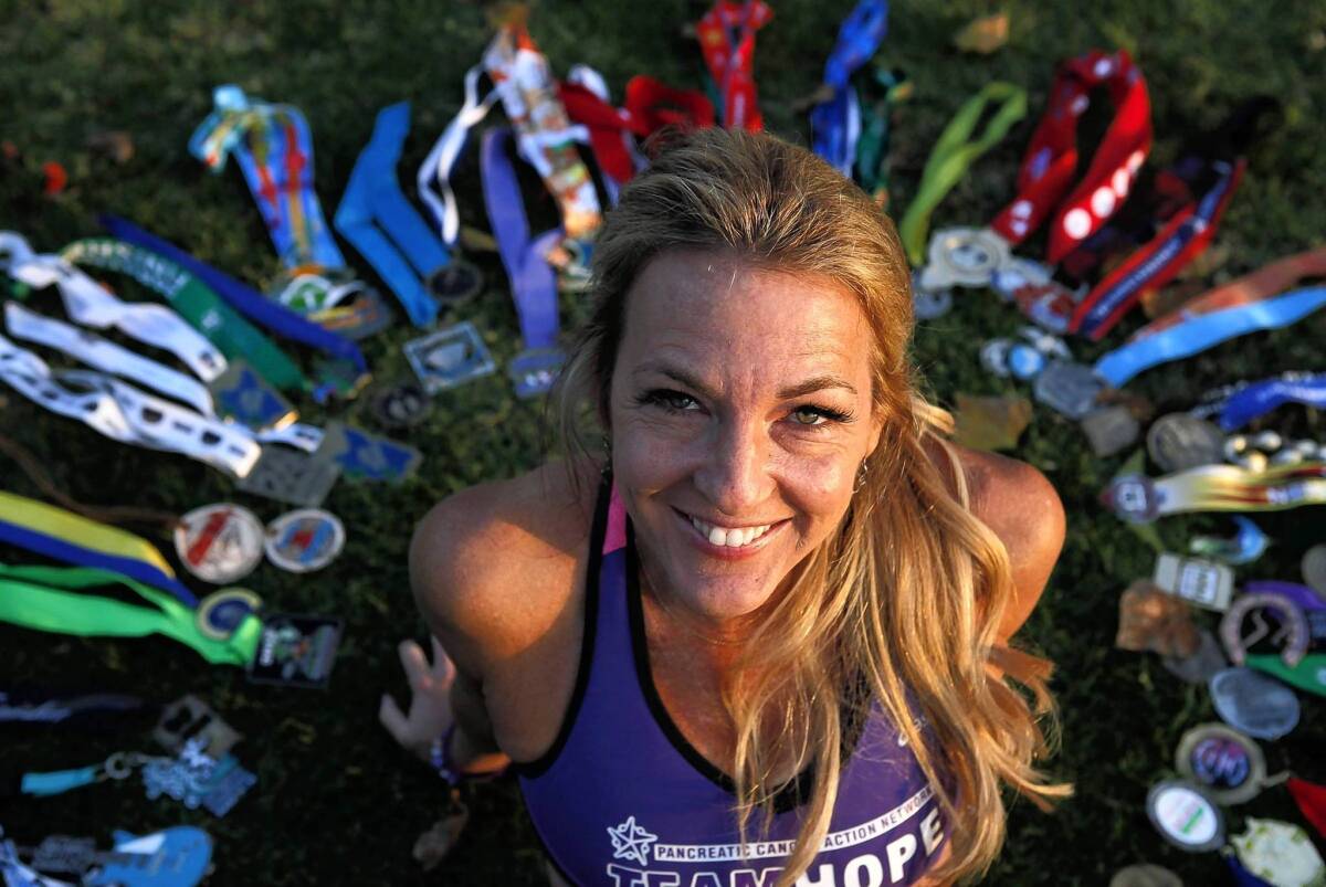 Julie Weiss has racked up many medals over her year of marathons.