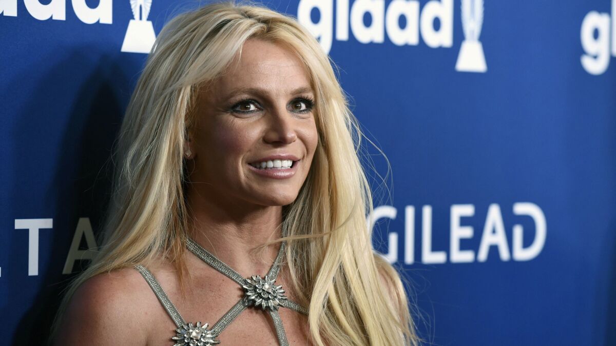 Britney Spears has been working on her health and on Tuesday addressed “out of control” rumors swirling around her since.