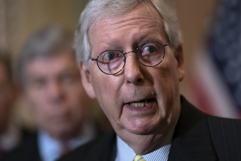 Senate Minority Leader Mitch McConnell, R-Ky., speaks with reporters following a closed-door caucus lunch, at the Capitol in Washington, Wednesday, June 22, 2022. (AP Photo/J. Scott Applewhite)