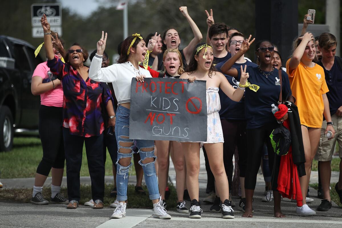 Protesting West Boca High students arrive at Marjory Stoneman Douglas High, site of last week's mass shooting.