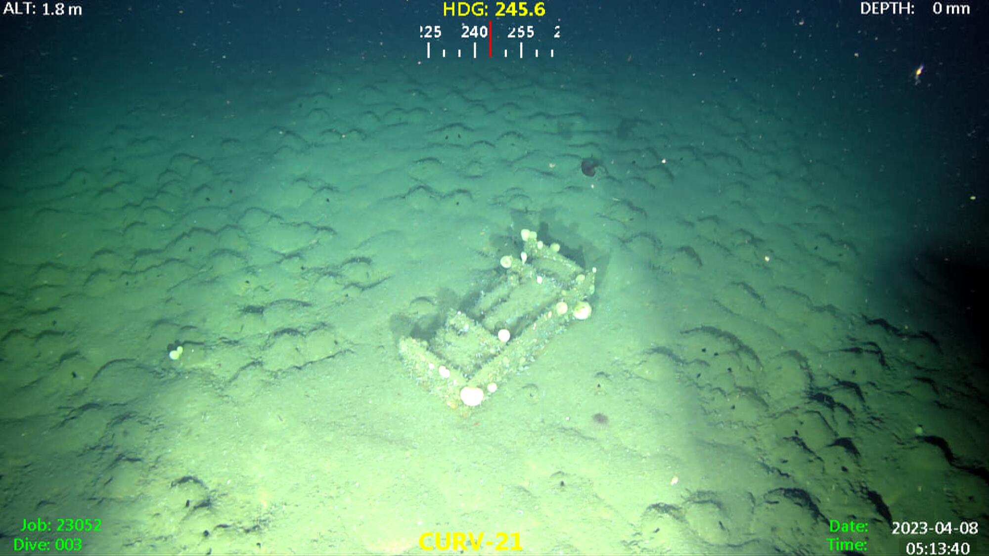 Underwater photo of a World War-II era munition box on the seafloor off the coast of Los Angeles. 