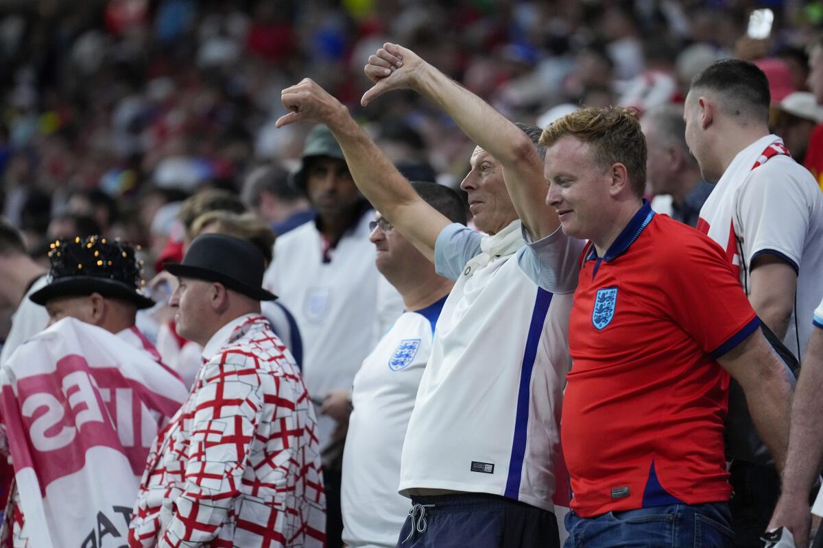 England national team fans look on during the World Cup match against the U.S.