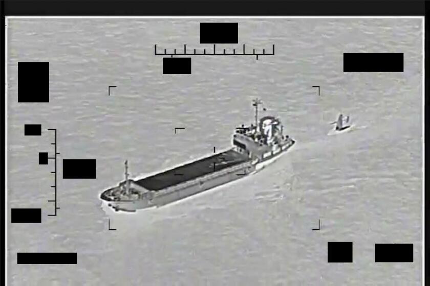This photo released by the U.S. Navy shows the Iranian Revolutionary Guard ship Shahid Bazair, left, towing a U.S. Navy Saildrone Explorer in the Persian Gulf on Tuesday, Aug. 30, 2022. The U.S. Navy's Mideast-based 5th Fleet said Tuesday that Iran's paramilitary Revolutionary Guard seized and later let go of a U.S. sea drone in the Persian Gulf. Iran did not immediately acknowledge the incident, though it comes amid heightened tensions over Tehran's tattered nuclear deal with world powers. (U.S. Navy via AP)