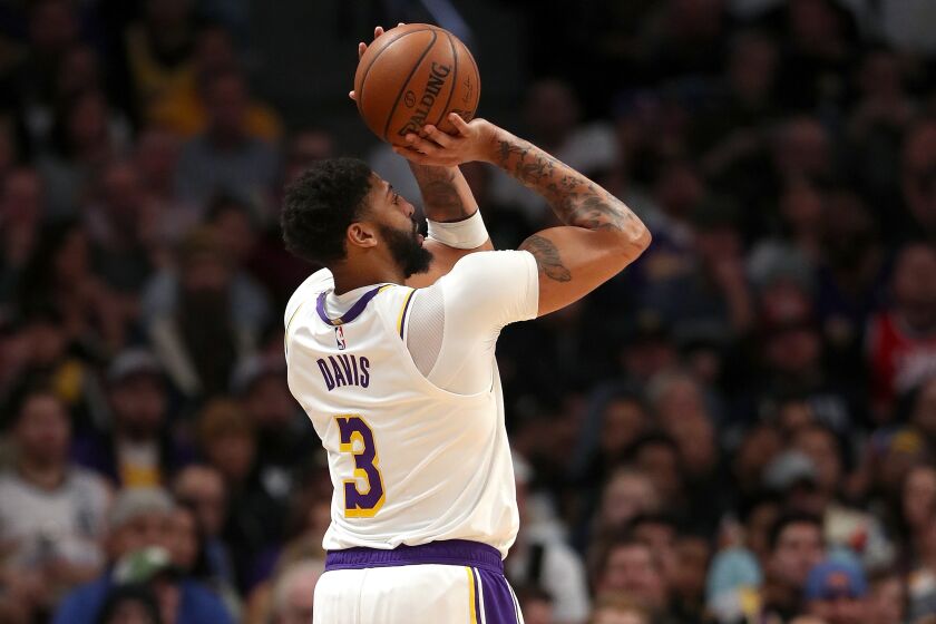 DENVER, COLORADO - DECEMBER 03: Anthony Davis #3 of the Los Angeles Lakers puts up a shot against the Denver Nuggets in the third quarter at Pepsi Center on December 03, 2019 in Denver, Colorado. NOTE TO USER: User expressly acknowledges and agrees that, by downloading and or using this photograph, User is consenting to the terms and conditions of the Getty Images License Agreement. (Photo by Matthew Stockman/Getty Images) ** OUTS - ELSENT, FPG, CM - OUTS * NM, PH, VA if sourced by CT, LA or MoD **