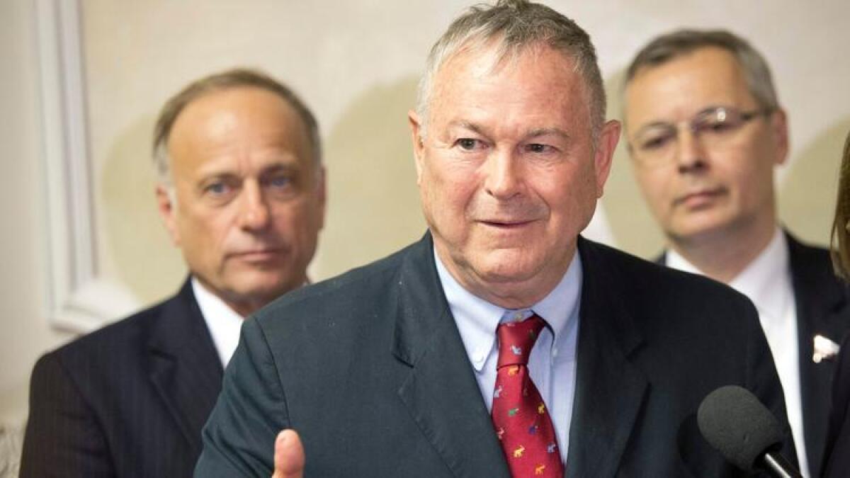 Rep. Dana Rohrabacher speaks to Russian lawmakers at a meeting in the Russian parliament's lower house in Moscow in 2013.