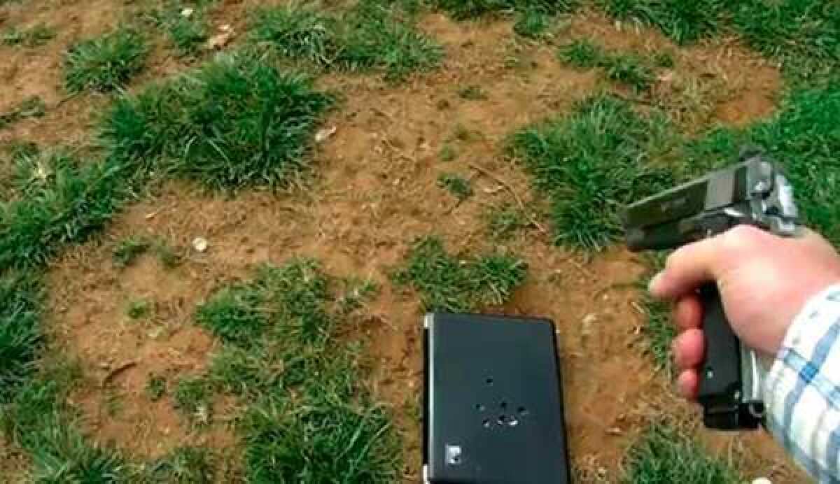 This frame grab taken from an undated video posted on YouTube Feb. 8, 2012 by Tommy Jordan of Albemarle, N.C. shows Jordan answering his teenage daughter's Facebook complaints by firing several rounds from his handgun into his daughter's laptop her computer as it lies on the ground. More than 26 million people have seen the video in which Jordan reads and replies to his daughter's rant before emptying his .45-caliber pistol into her laptop.