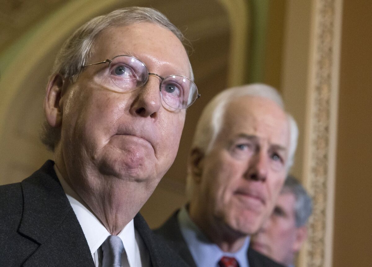 Senate Majority Leader Mitch McConnell (R-Ky.), left, and Sen. John Cornyn (R-Texas) don't really want employees to be safe.