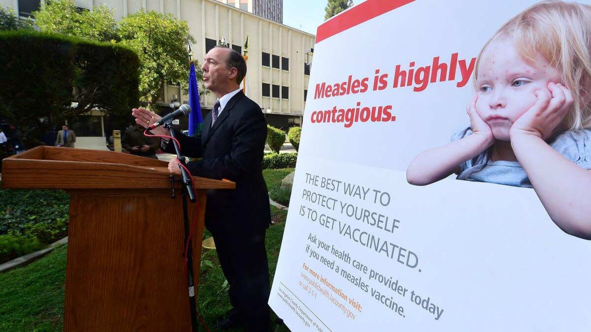 Dr. Jeffrey Gunzenhauser of the Los Angeles County Department of Public Health briefs the media on the measles in 2015.