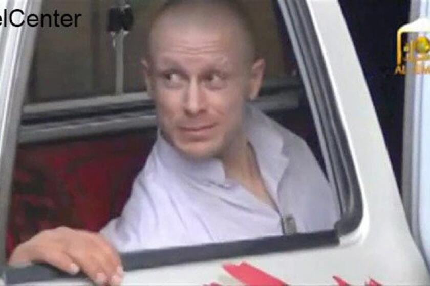 Captured US Army soldier Bowe Bergdahl during his release by Taliban fighters at an undisclosed location in Afghanistan. Bergdahl was released on May 31 in a swap for five senior Taliban members held in Guantanamo Bay prison.