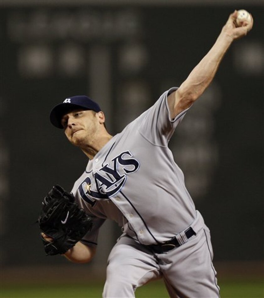 Tampa Bay Rays starting pitcher Scott Kazmir delivers during the first inning of a baseball game against the Boston Red Sox at Fenway Park in Boston on Tuesday, Sept. 9, 2008. (AP Photo/Winslow Townson)