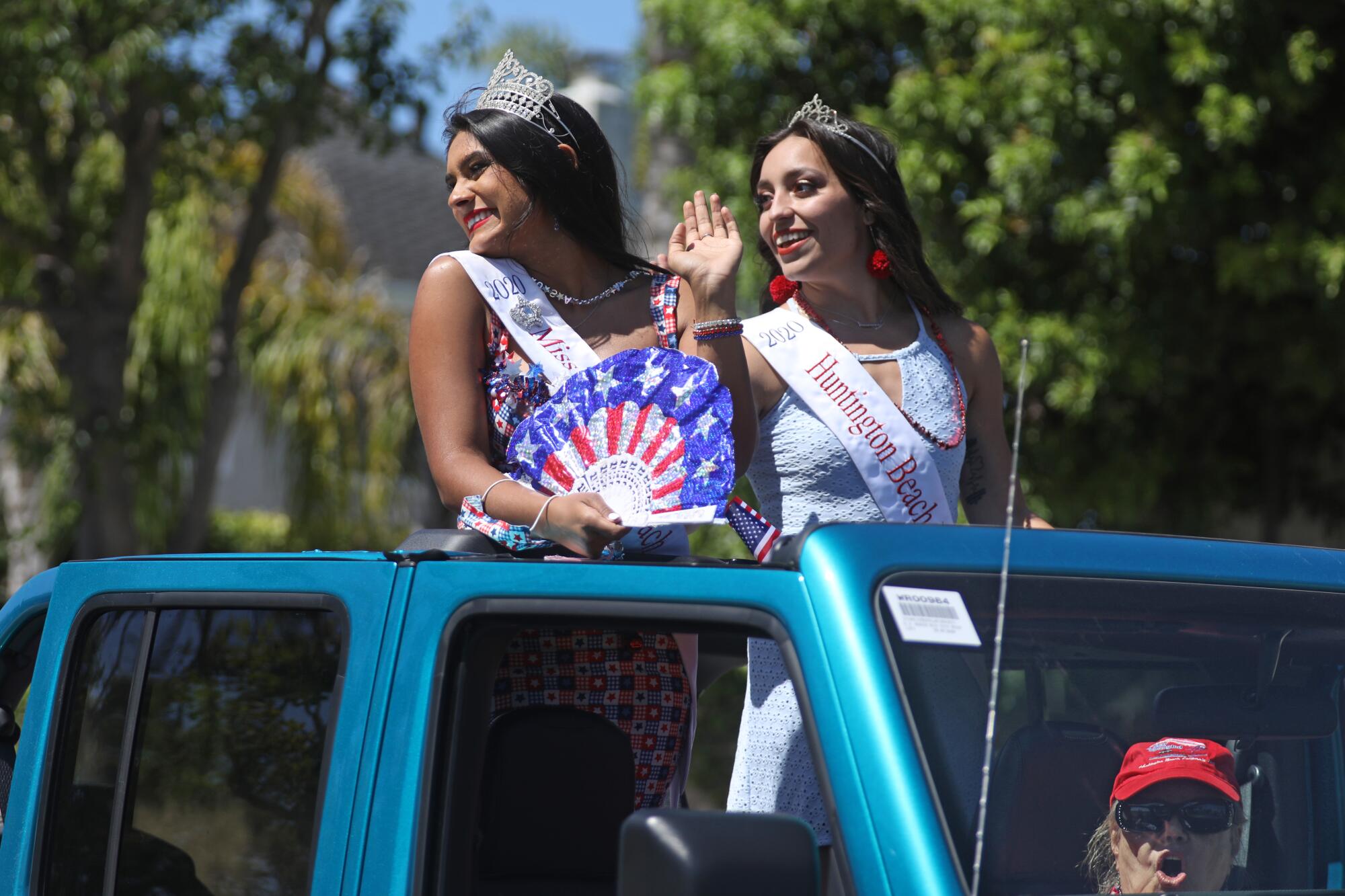 Miss Huntington Beach and Court is represented in the OneHB Neighborhood Parade in Huntington Beach celebrating July 4
