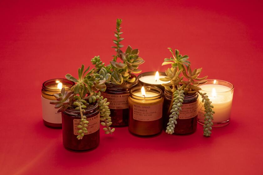 EL SEGUNDO, CA, NOVEMBER 27 2019 - Pine tree scented candles and repurposed potted plants photographed in the Los Angeles Times studio November 27, 2019. (Photo By Ricardo DeAratanha / Los Angeles Times)