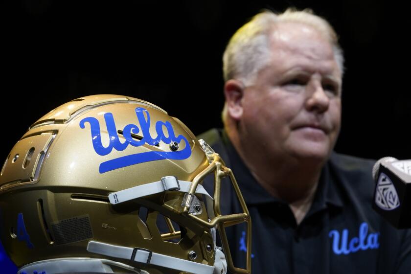 UCLA coach Chip Kelly speaks during the Pac-12 Conference NCAA college football media day.