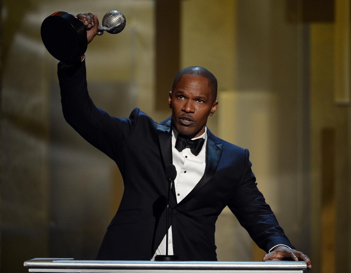 Actor Jamie Foxx acceps the Entertainer of the Year award at the 44th NAACP Image Awards.