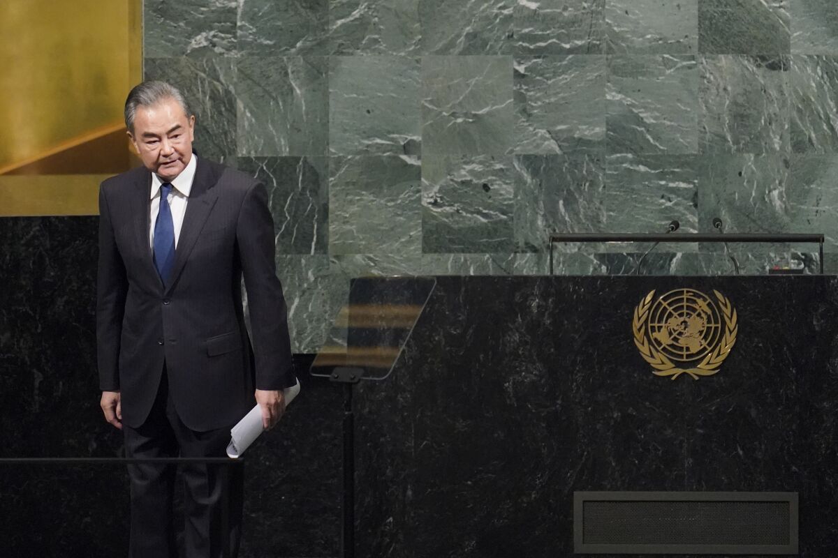Foreign Minister of China Wang Yi acknowledges the audience applause after addressing the 77th session of the United Nations General Assembly, Saturday, Sept. 24, 2022 at U.N. headquarters. (AP Photo/Mary Altaffer)