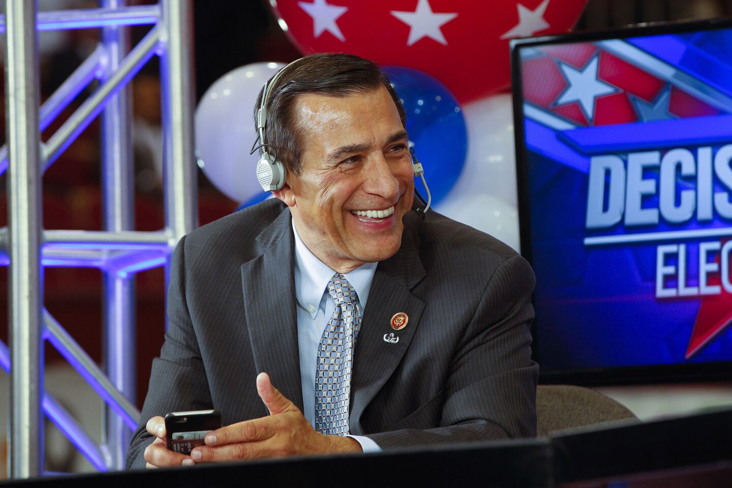 Incumbent Darrel Issa for the 49th Congressional District sits during a television interview at Golden Hall on election night. Issa won a ninth term by roughly 1,600 votes, a narrow 0.6 percent victory margin, after fending off an unexpectedly strong Democratic challenger in former Marine Col. Doug Applegate. Issa had gotten at least 58 percent of the vote in his eight previous campaigns. Applegate and others had made Issa's support of Trump a central issue.