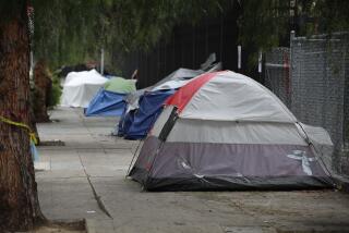Los Angeles, CA - May 24: Dozens of homeless remain in tents on the sidewalks in the El Pueblo de Los Angeles area of downtown Los Angeles Wednesday, May 24, 2023. Since taking office, Mayor Karen Bass has told audiences that she has found that L.A.'s unhoused will say yes when offered the chance to move inside. But in some locations, the mayor is hitting a wall - sending her Inside Safe team to encampments where not everyone has been willing to leave. On the sidewalks around the El Pueblo Historic Monument in downtown Los Angeles, some have decided to stay put. There and in other locations, new homeless people have quickly arrived, putting up new tents. (Allen J. Schaben / Los Angeles Times)