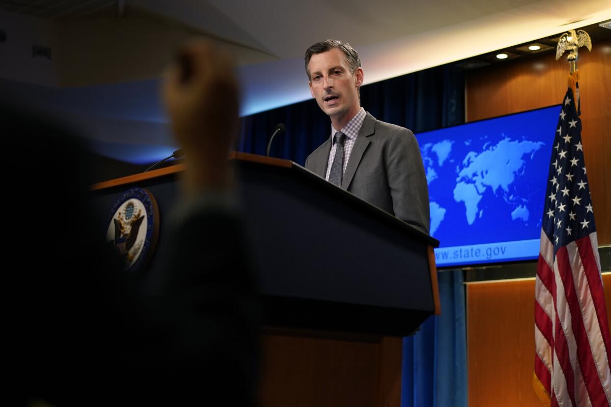 State Department spokesman Ned Price speaks to a reporter at the State Department in Washington, Wednesday, March 31, 2021. (AP Photo/Carolyn Kaster, Pool)