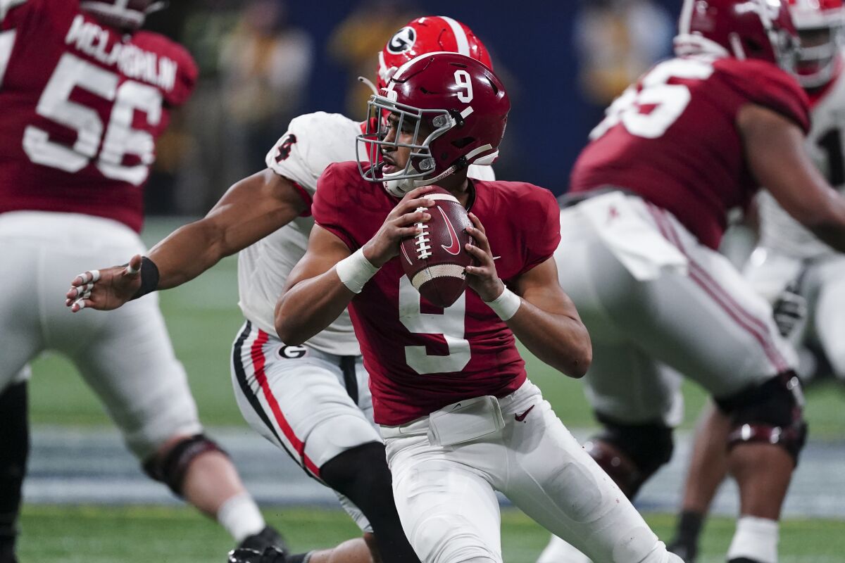 Alabama quarterback Bryce Young looks to pass during the Crimson Tide's win over Georgia.