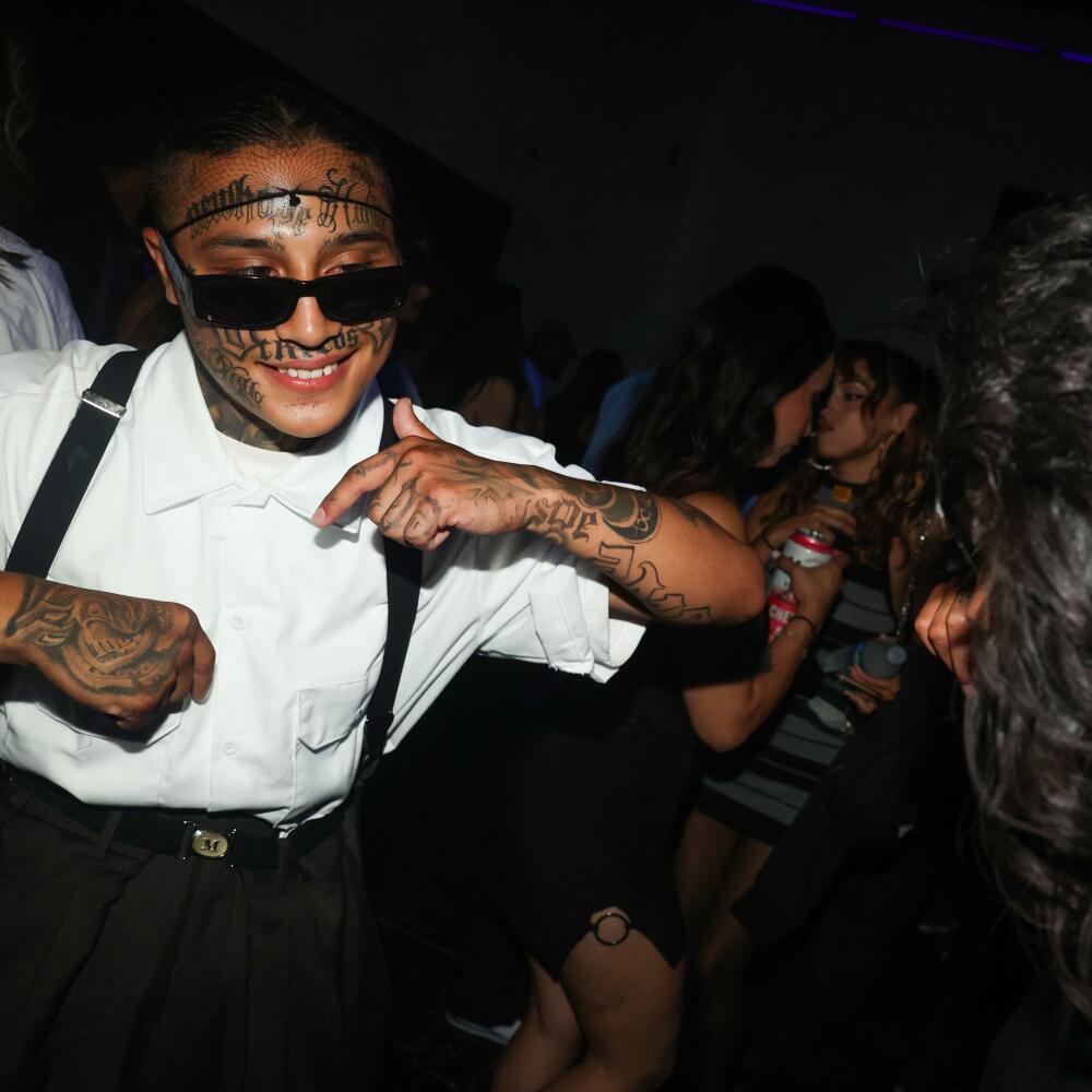 Lil Frisky Boy dances alongside Luna during the Night of the Blaxican event at Alpha Studios Production Lot.