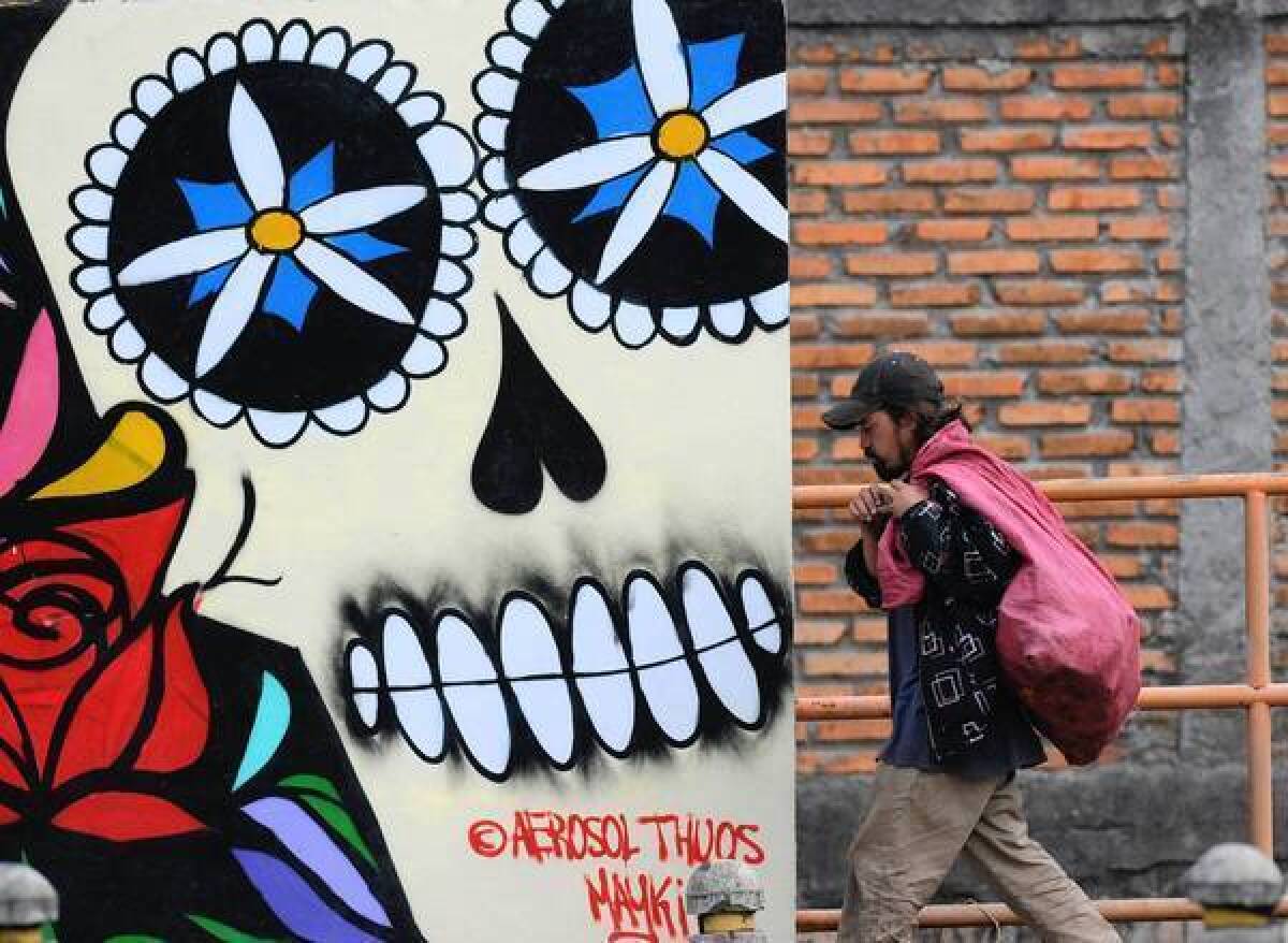 Street art refers to violence in Tegucigalpa, Honduras' capital.