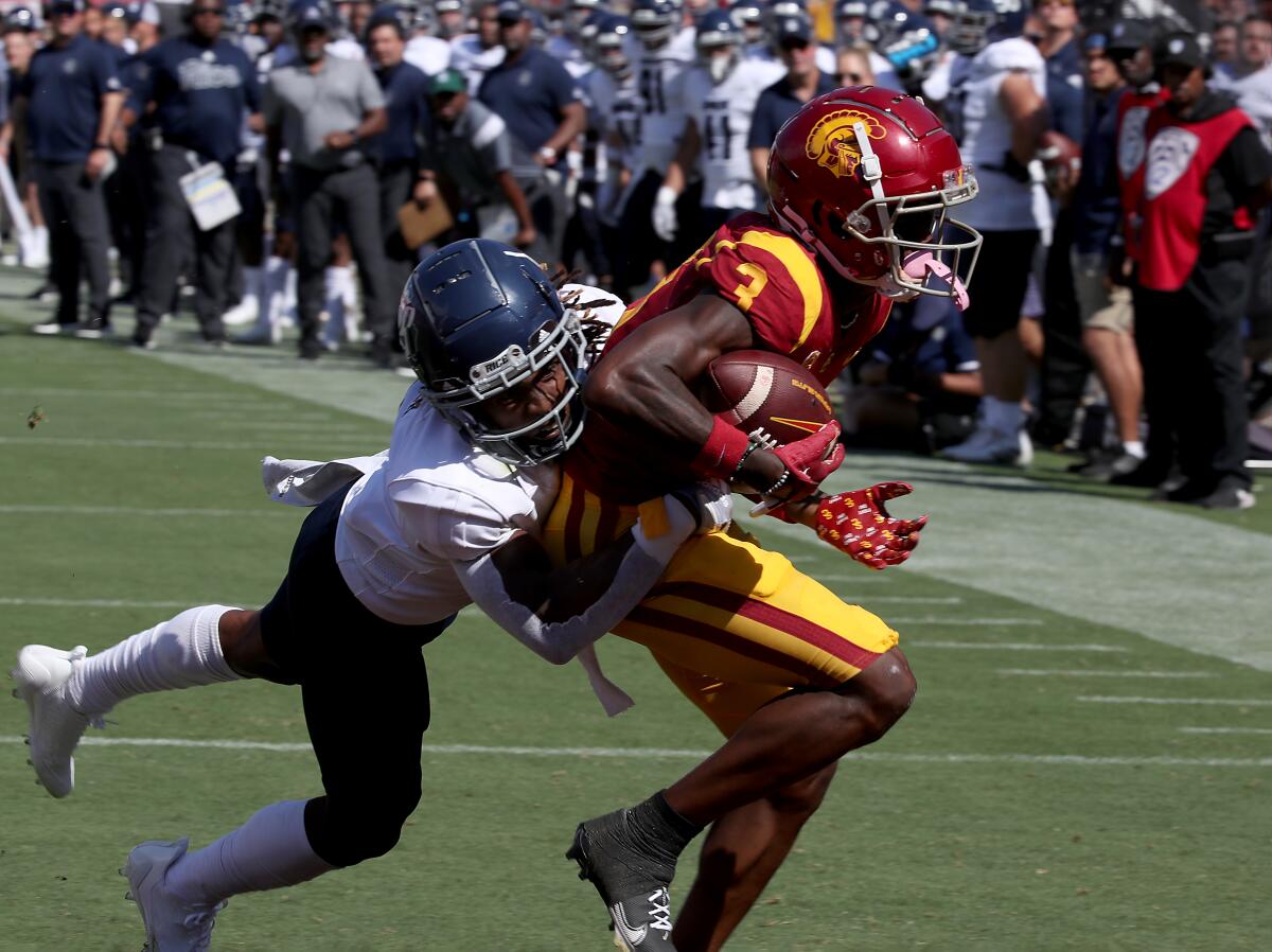 USC wide receiver Jordan Addison breaks away from Rice defensive back Sean Fresch.