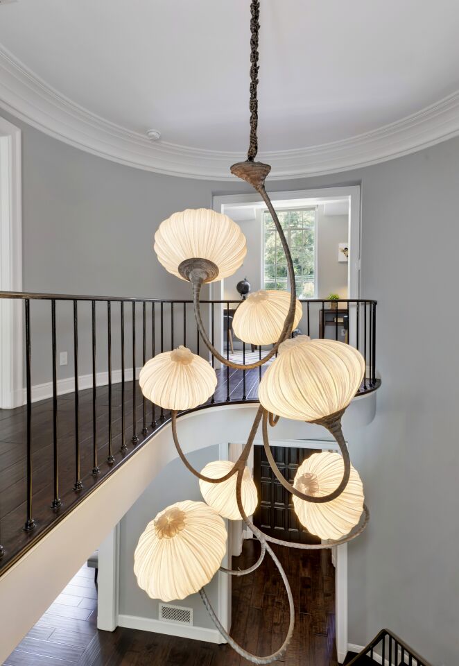 A striking chandelier is among updates.