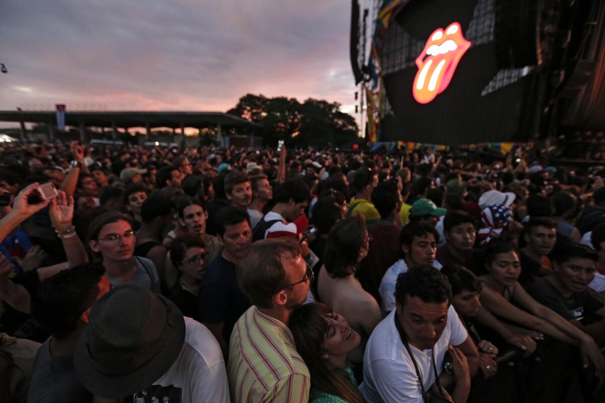 The sun sets moments before the Rolling Stones deliver a historic free performance to hundreds of thousands of people at Ciudad Deportiva in Cuba.