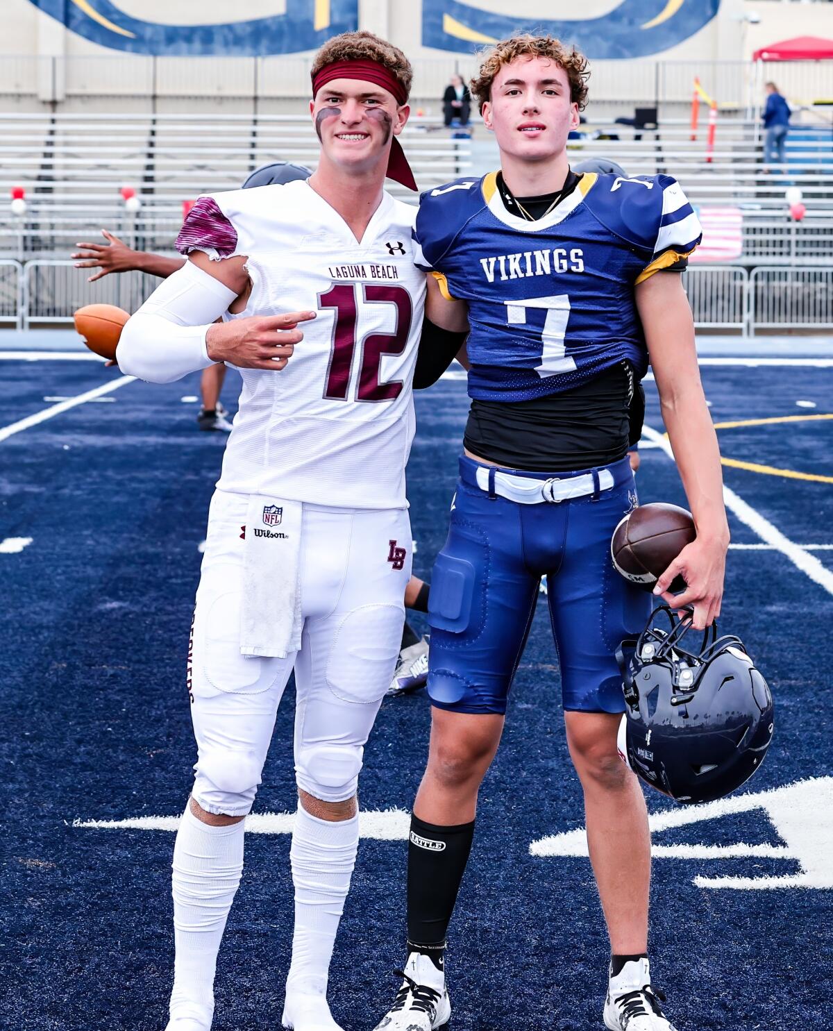 Quarterbacks Jackson Kollock (left) of Laguna Beach and Wyatt Brown of Santa Monica pose for a photo.