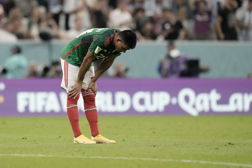 Mexico's Jesus Gallardo reacts at the end of the World Cup group C soccer match between Argentina and Mexico, at the Lusail Stadium in Lusail, Qatar, Saturday, Nov. 26, 2022. Argentina won 2-0. (AP Photo/Moises Castillo)