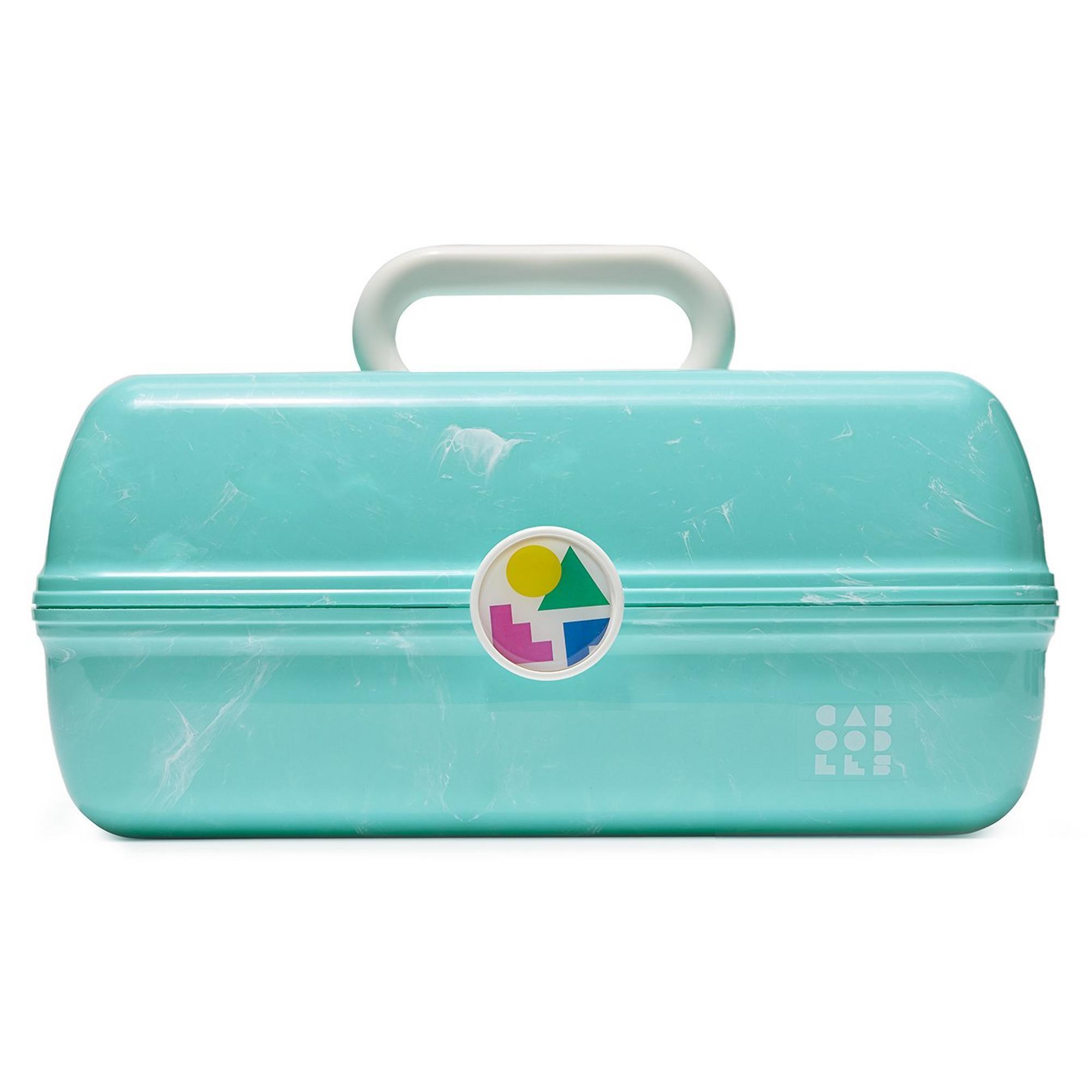 A teal, rounded-edge, plastic Caboodle case.