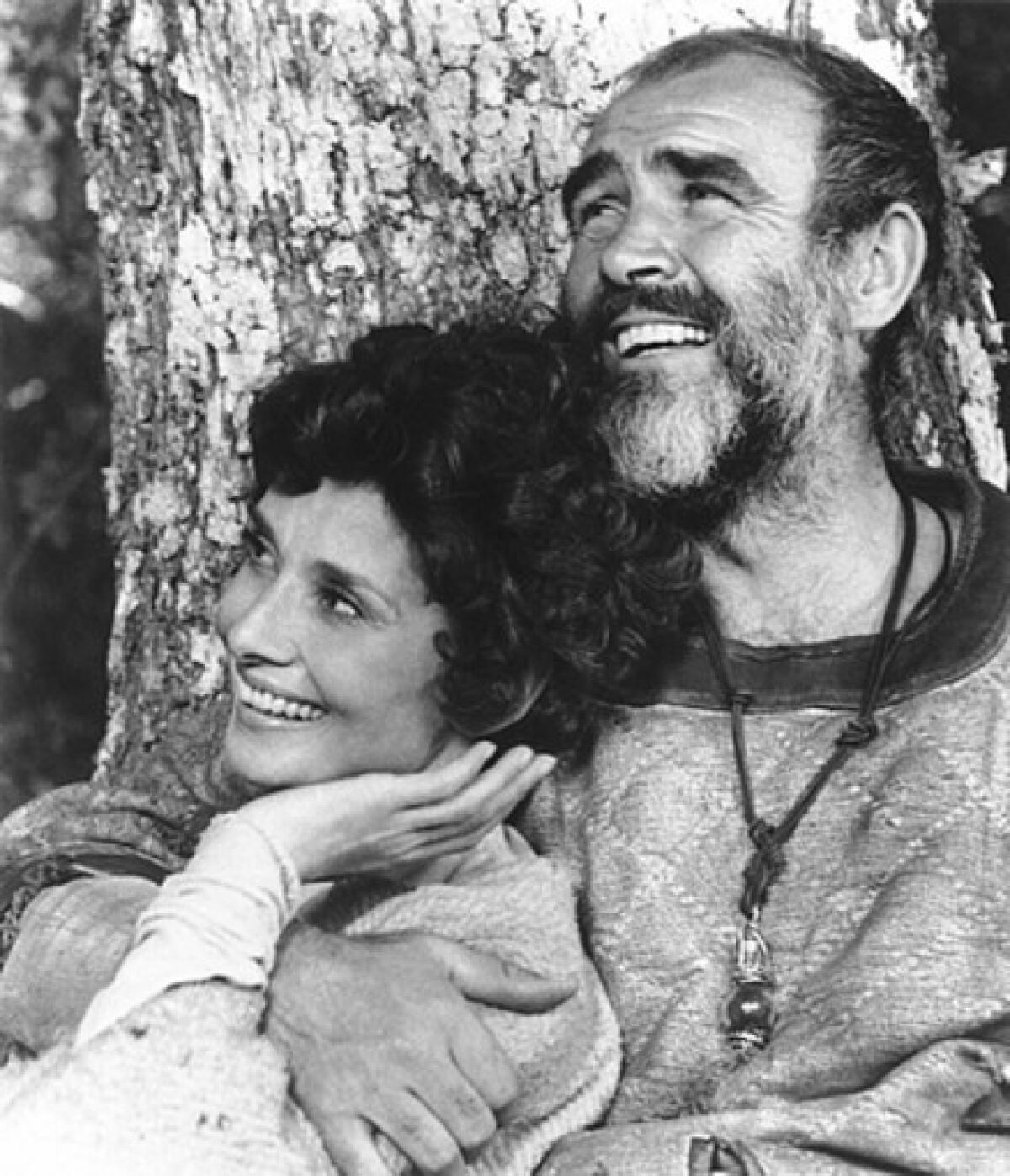 Sean Connery embraces Audrey Hepburn in the movie "Robin and Marian."