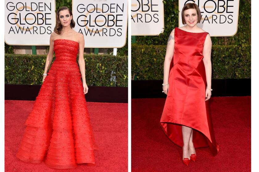 "Girls" are all right in red: Allison Williams, left, in a strapless crimson gown by Giorgio Armani, and Lena Dunham in Zac Posen.