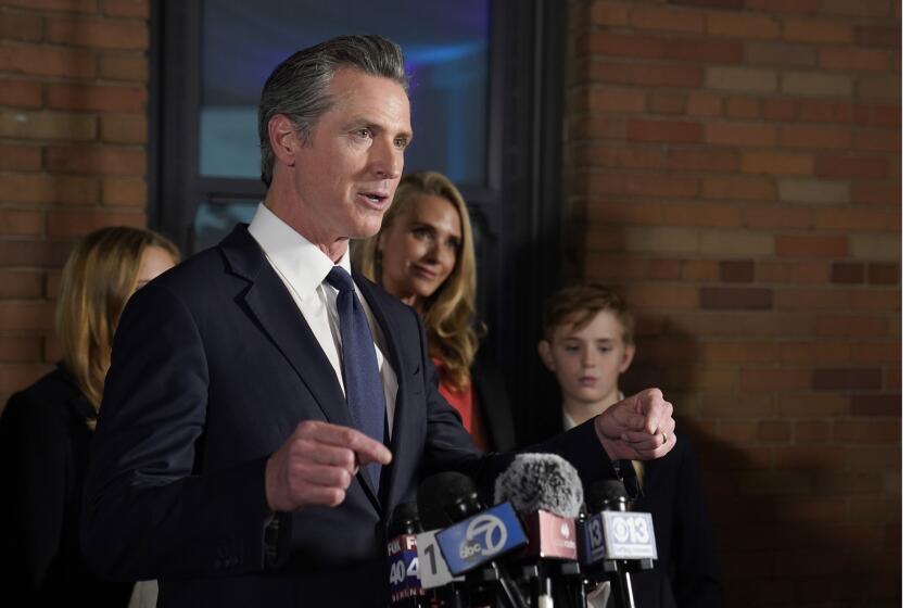 California Gov. Gavin Newsom, accompanied by his wife, Jennifer Siebel Newsom and their children, delivers remarks after winning his second term in office, in Sacramento, Calif., Tuesday, Nov. 8, 2022. (AP Photo/Rich Pedroncelli)