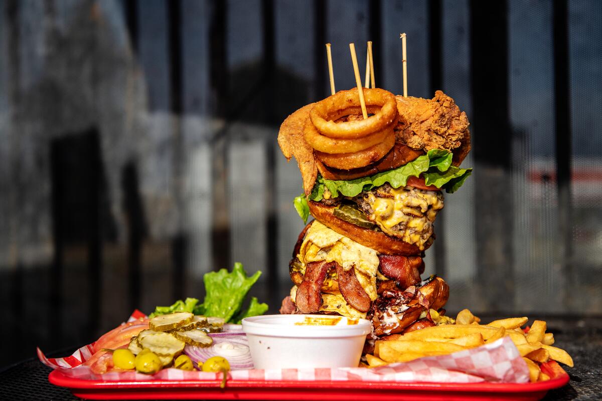 Leaning Tower of Watts burger at Hawkins House of Burgers