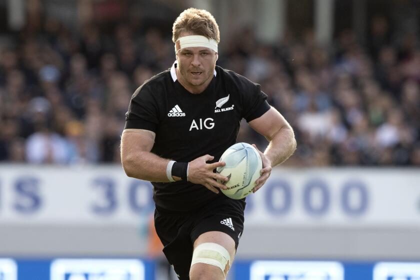 All Blacks captain Sam Cane runs during the second Bledisloe Rugby test between the All Blacks and the Wallabies at Eden Park in Auckland, New Zealand, Sunday, Oct. 18, 2020. Cane announced Monday May 13, 2024 that he was retiring from international rugby at the end of the 2024 season. (AP Photo/Mark Baker)