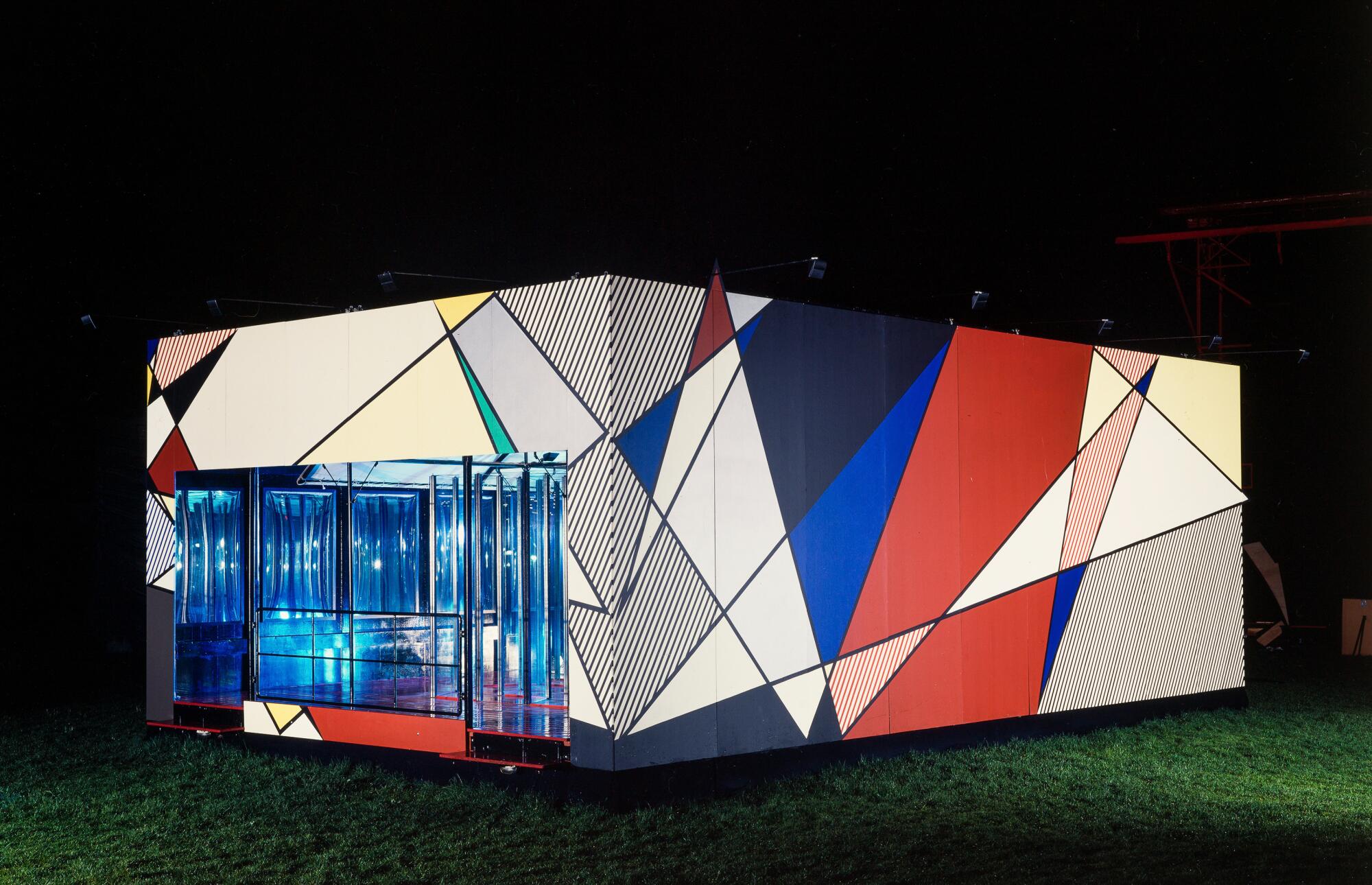 A colorful, free-standing rectangle decorated with geometric designs