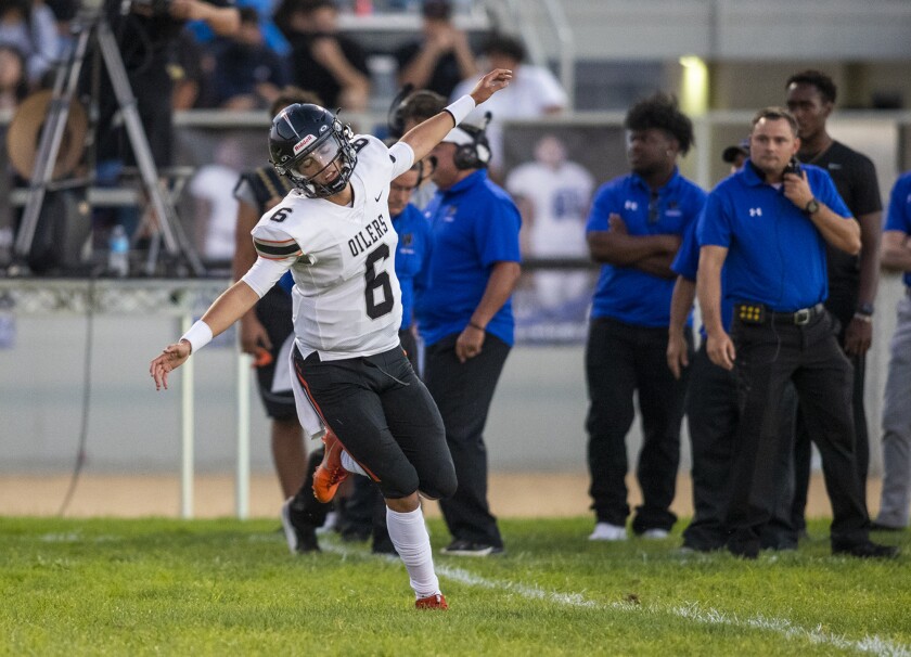 Huntington Beach quarterback AJ Perez, shown on Aug. 26, had four touchdown passes in Friday's win over Long Beach Wilson.