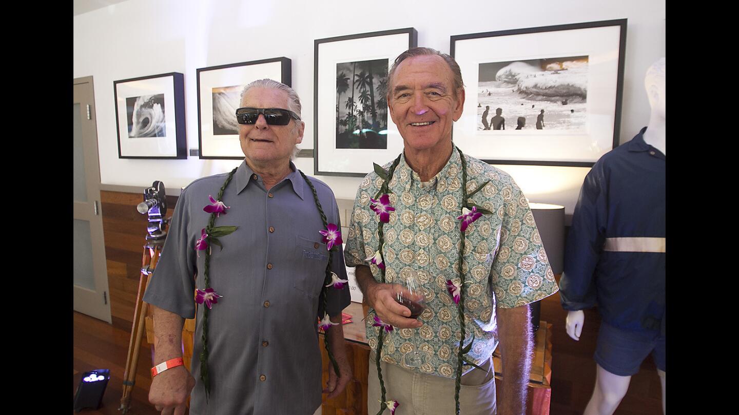 Mike Hynson, left, and Robert August, the stars of the iconic surf movie "The Endless Summer," attend the book launch party and celebration of the 50th anniversary of the exploration and travel surf movie.