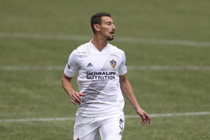 Galaxy defender Daniel Steres looks across the field during a match against the Portland Timbers in May 2021