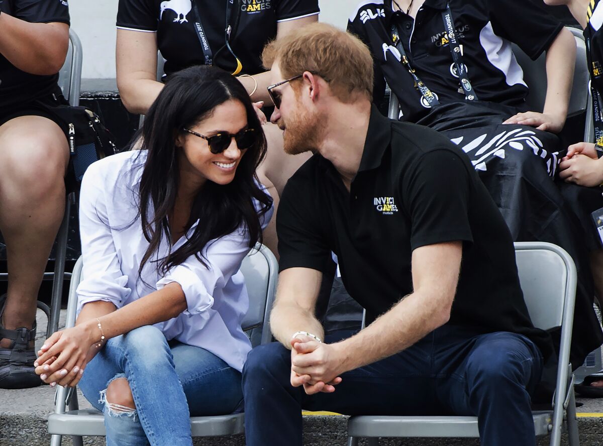 Prince Harry and Meghan Markle on a date at a wheelchair tennis competition in Toronto in 2017.