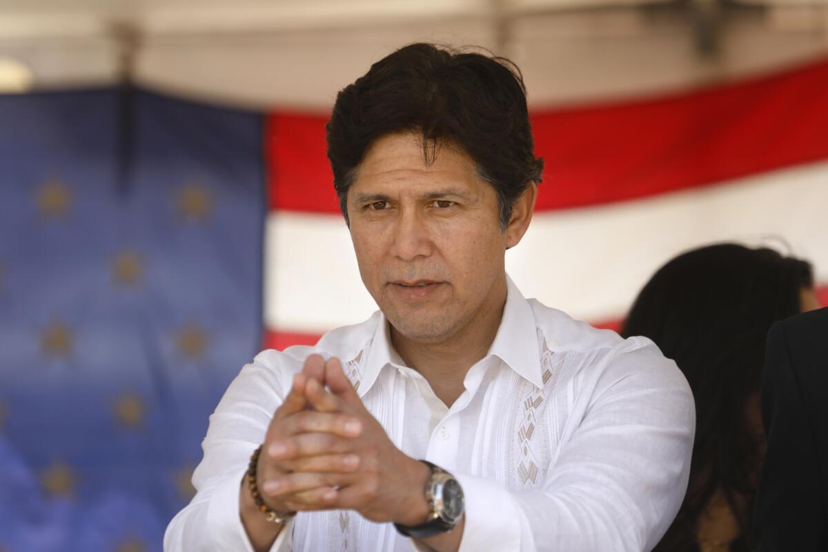 Then-mayoral candidate Kevin de Leon gestures at a Memorial Day celebration. 