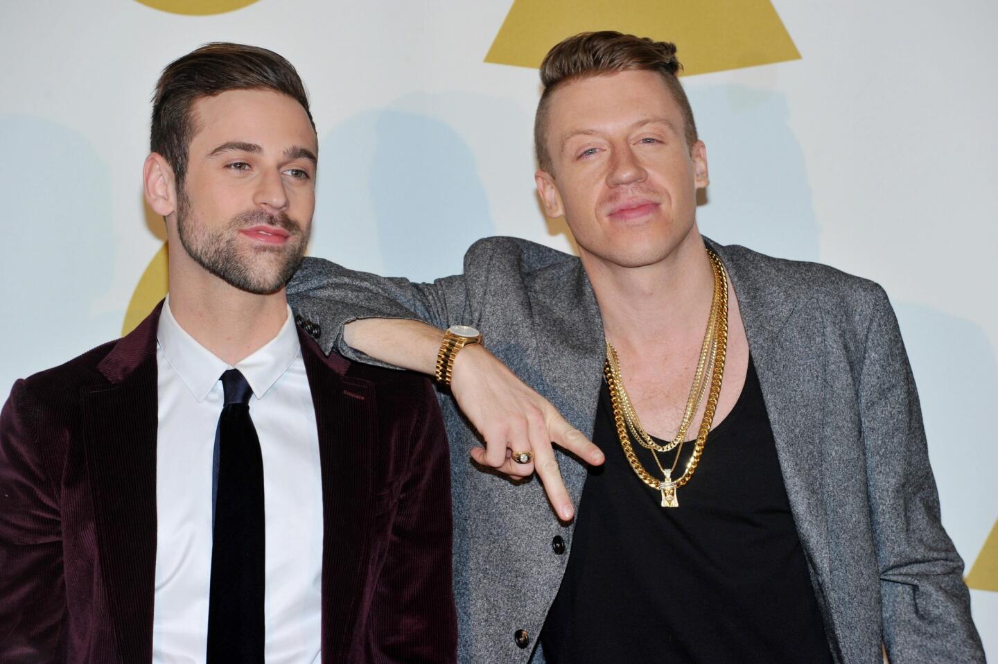 Ryan Lewis, left, and Macklemore pose backstage at the "Grammy Nominations Concert Live!" on Friday at the Nokia Theatre at L.A. Live.