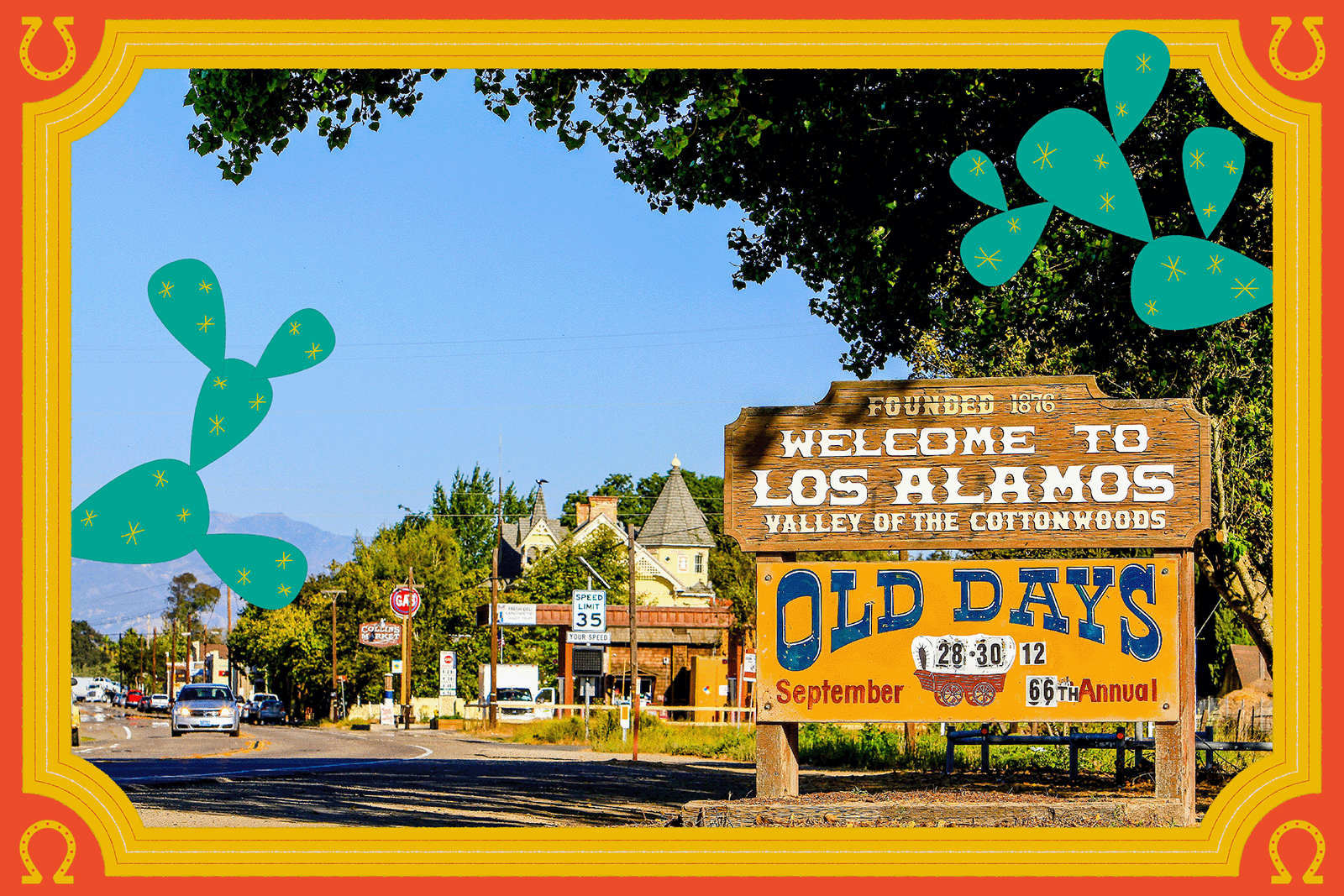 Photo of a sign that reads "Welcome to Los Alamos" with a town in the background.