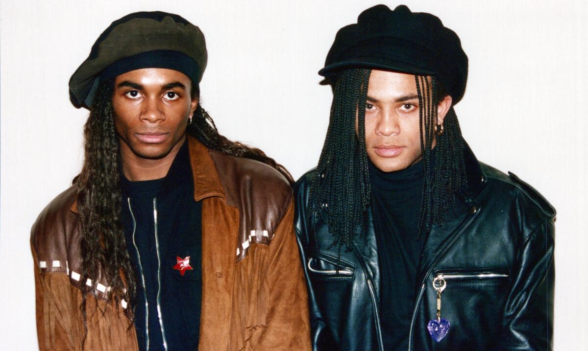 Pop duo Milli Vanilli in berets and leather jackets